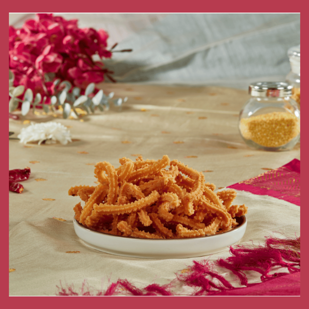 Authentic South Indian Snack Spicy Murukku 180g served in a white bowl with traditional decor