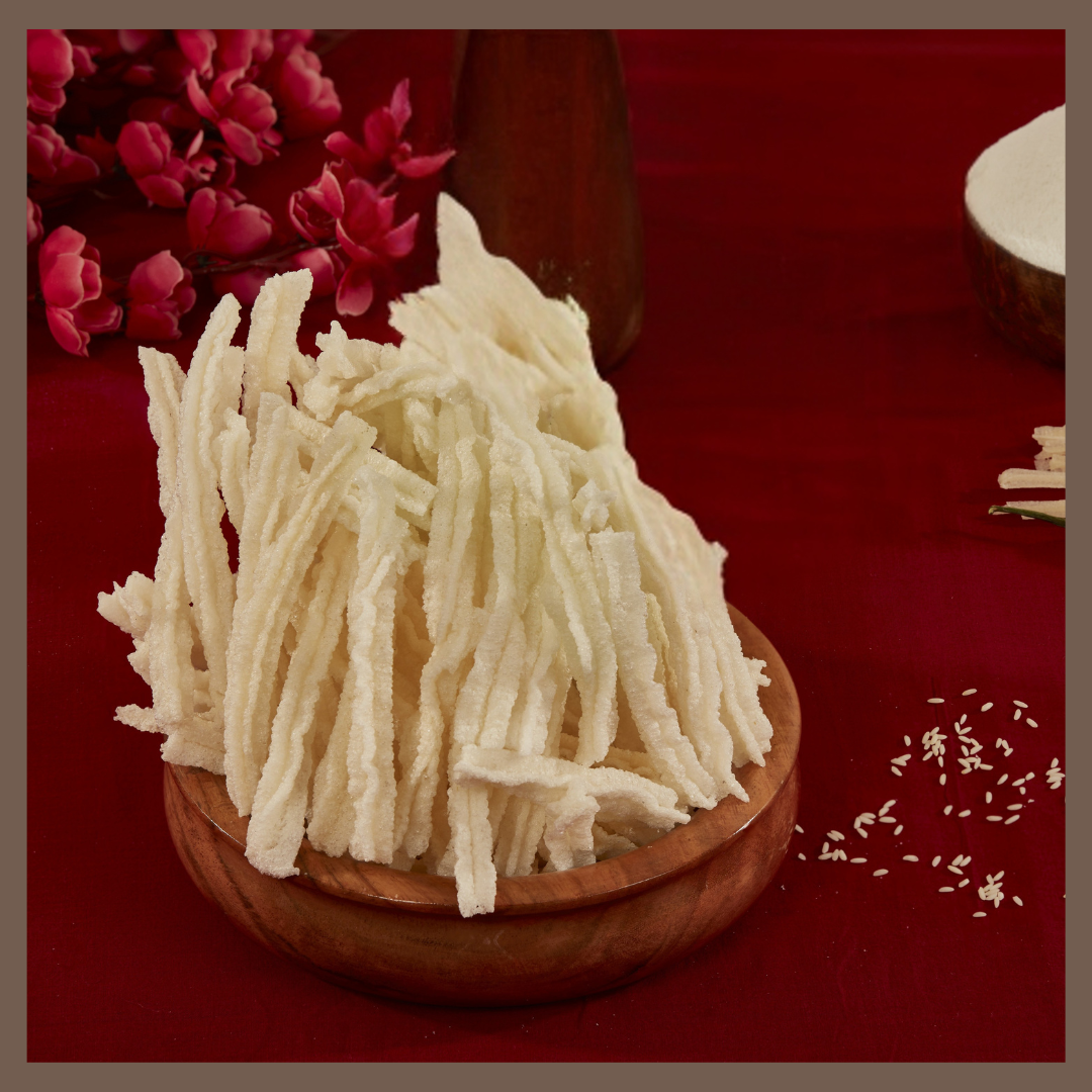 Malu's crispy white Kuchi Vadam snack arranged in a wooden bowl for Kuchi Vadam online purchase